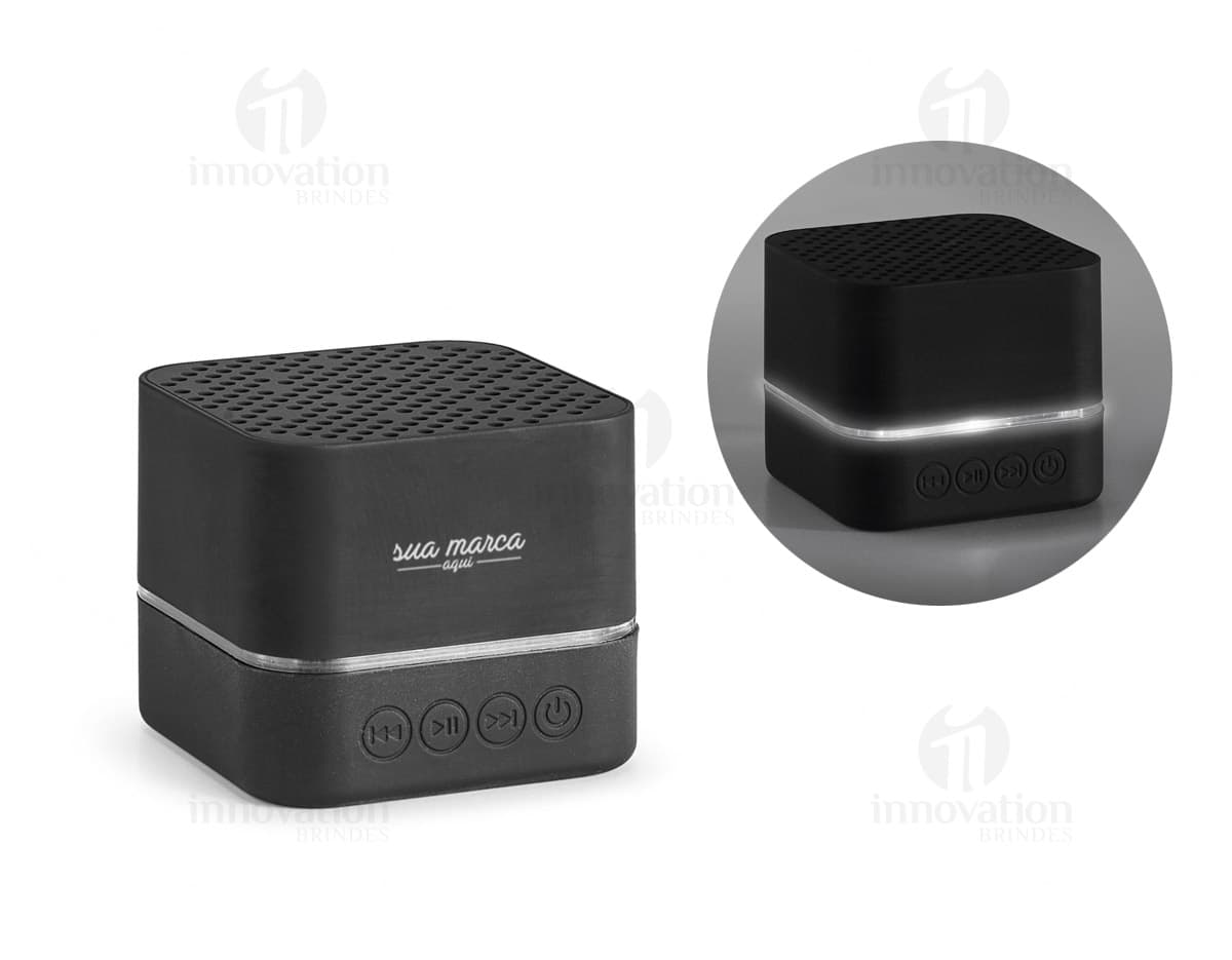 Caixa de som preta de alta tecnologia para escritório. Acessório indispensável para reuniões e conferências, com design moderno e som de alta qualidade. Perfeita para armazenar e reproduzir áudios com facilidade e praticidade. Adquira já a sua e turbine sua produtividade!