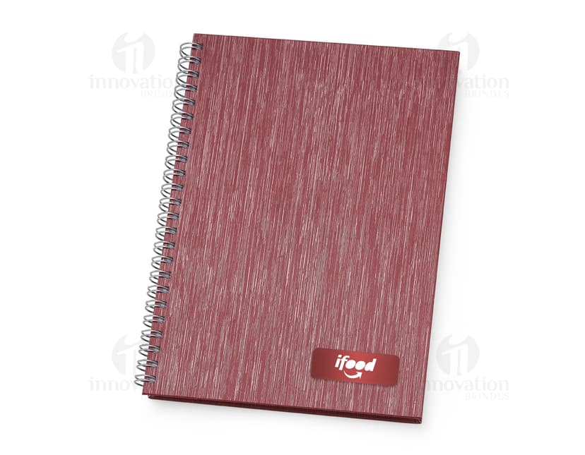 Caderno de negócios feito de papel reciclado, ideal para anotações e organização. Com capa de papelão vazia e páginas em branco, é perfeito para manter suas ideias e compromissos sempre à mão. Garanta o seu e promova a sustentabilidade no dia a dia!