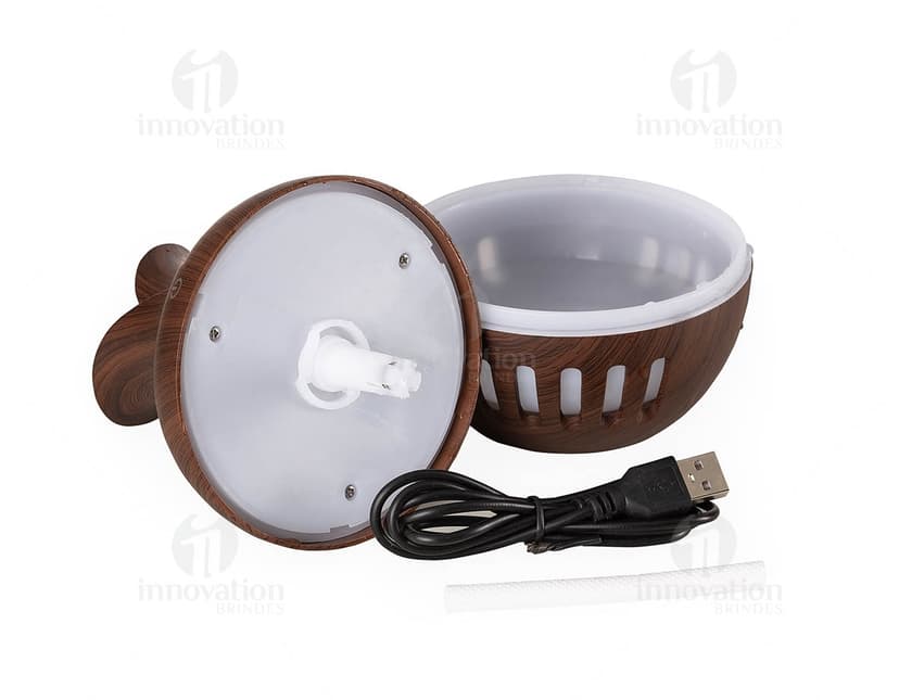 Umidificador de madeira com LED, design clássico e elegante para o seu ambiente. Ideal para deixar o ar mais saudável e perfumado. Aromatize o seu espaço de forma tradicional e sofisticada. Adquira já o seu!