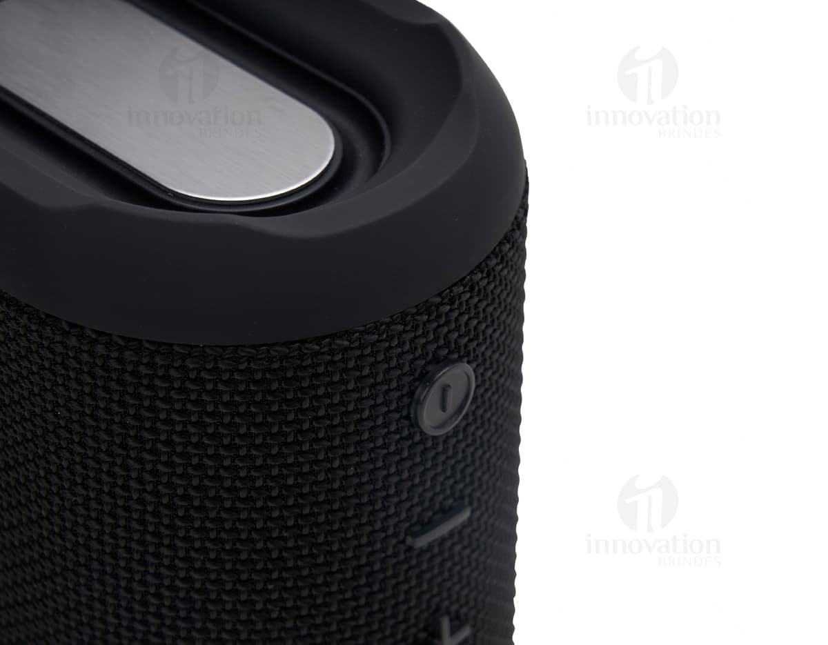Caixa de som preta e prata moderna para áudio de alta qualidade. Equipamento eletrônico com tecnologia avançada para amplificar o som. Ideal para música e entretenimento. Adquira a sua agora!