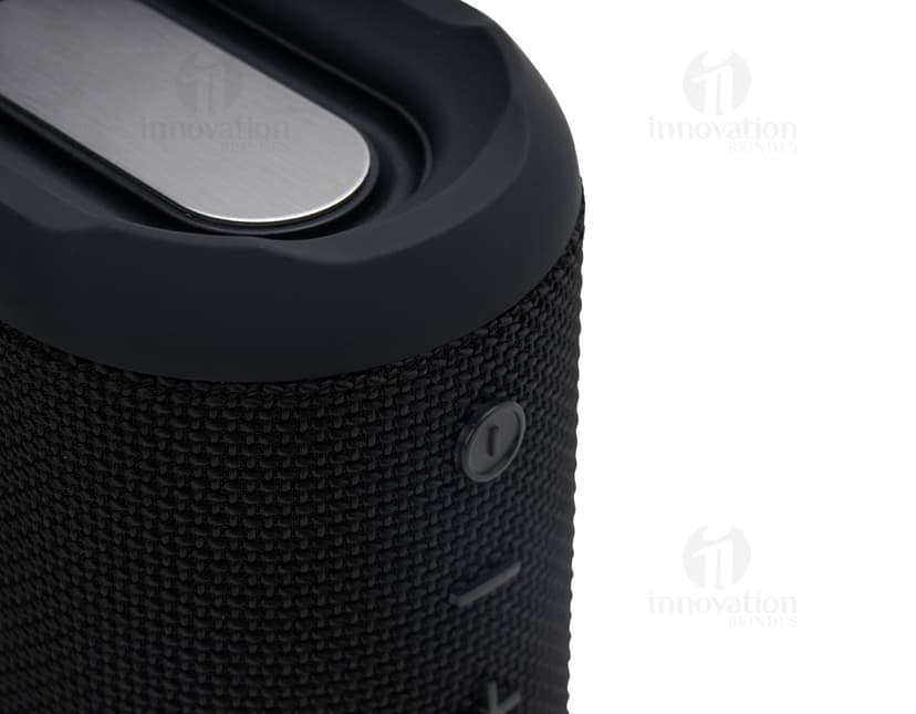 Caixa de som preta e prata moderna para áudio de alta qualidade. Equipamento eletrônico com tecnologia avançada para amplificar o som. Ideal para música e entretenimento. Adquira a sua agora!