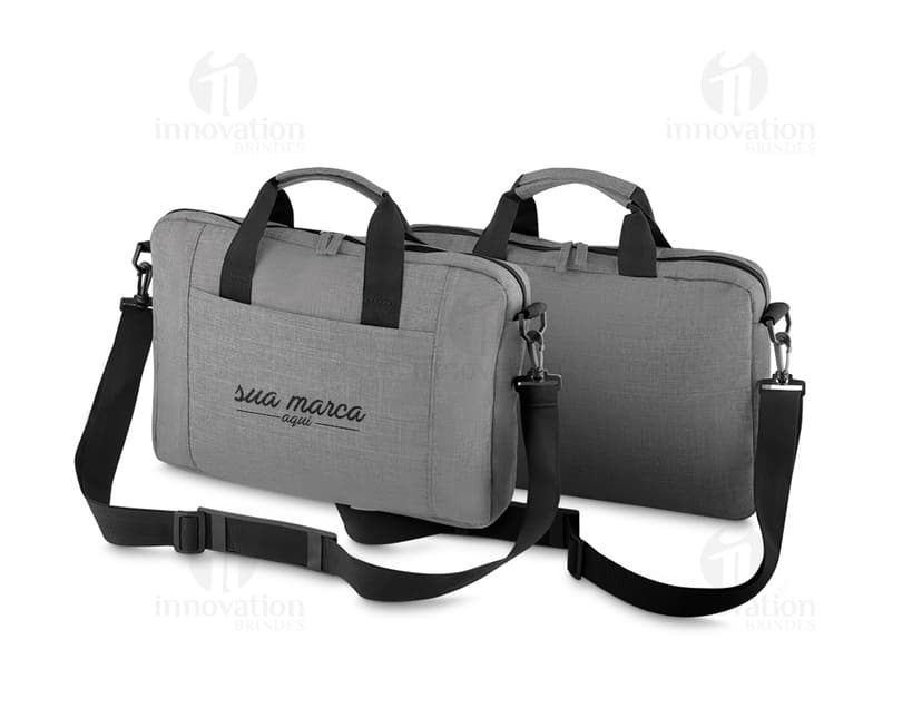Pasta executiva de couro clássica e elegante, perfeita para viagens de negócios e reuniões importantes. Com alça resistente e design contemporâneo, ideal para transportar seus equipamentos com estilo. Adquira já a sua!