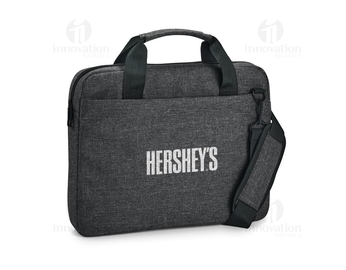 Pasta para notebook de couro preto elegante e moderna para negócios e viagens. Com fecho seguro, alça confortável e design sofisticado. Ideal para organizar seus pertences de forma prática e com estilo. Adquira já a sua!