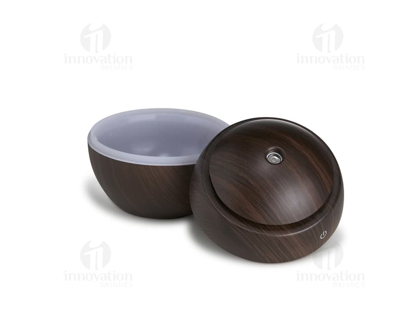 Mini umidificador com LED - Compacto e eficiente para manter o ambiente sempre fresco e hidratado. Ideal para escritório, casa ou viagens. Design moderno em metal, armazene no seu container em lata para fácil transporte. Adquira já o seu!