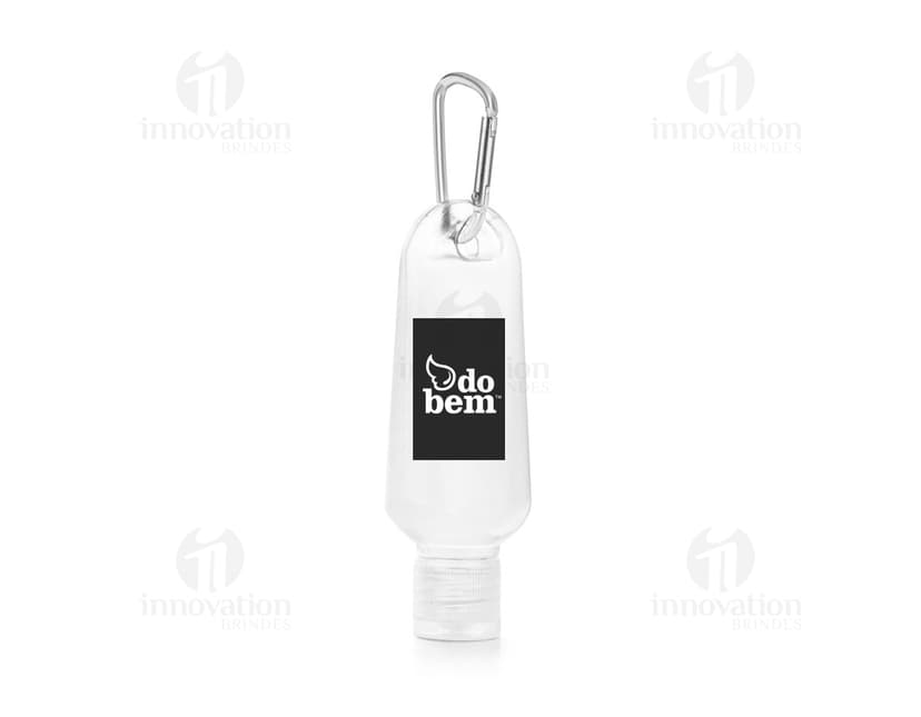 Frasco 50 ml transparente com tampa amarela, contendo líquido transparente. O frasco está vazio e limpo, faz parte de um conjunto de objetos de higiene e cuidados pessoais. É um recipiente moderno, com design clean e forma cilíndrica. A imagem mostra um produto para armazenar bebidas alcoólicas, como vodka ou vinho.