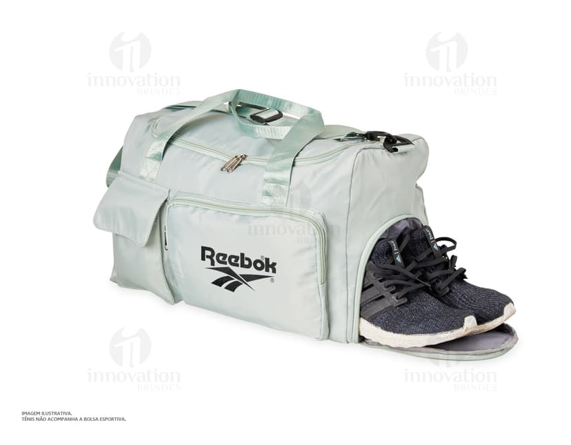 Bolsa esportiva de 28 litros em nylon marrom e preto com alças de couro, zipper, bolso e fivela. Ideal para viagens, academia e passeios.