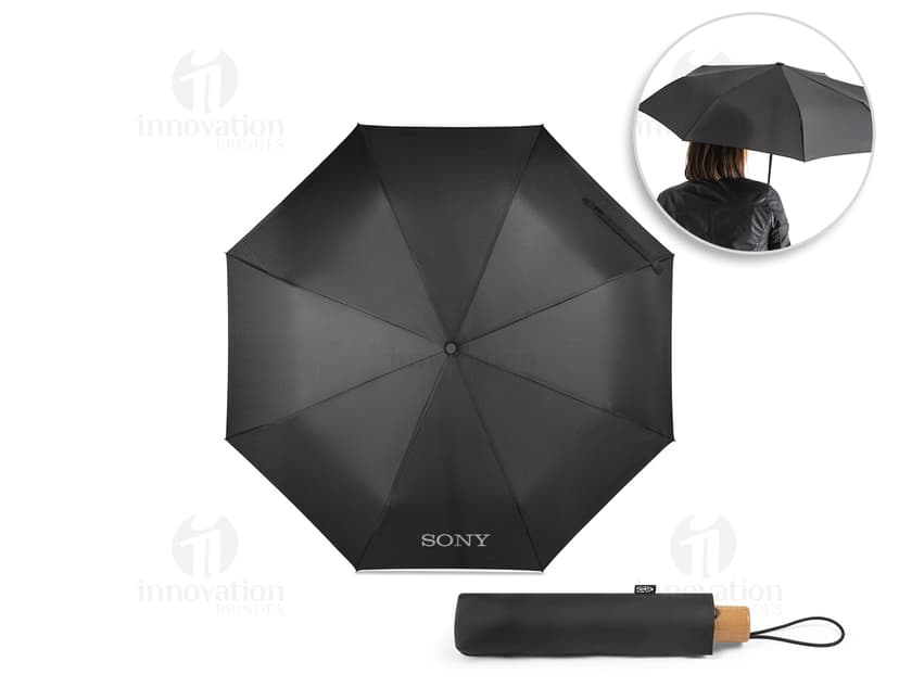 Guarda-chuva rPET pongee com pega, apresentado em uma caixa de presente colorida com laço. O guarda-chuva é brilhante e possui uma decoração festiva.