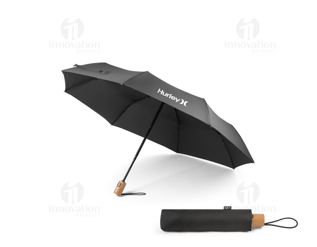 Guarda-chuva rPET pongee com pega, apresentado em uma caixa de presente colorida com laço. O guarda-chuva é brilhante e possui uma decoração festiva.