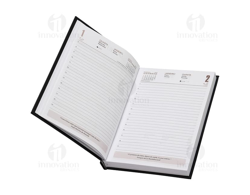 Agenda 2025 Cromato com capa dura na cor prateada e detalhes em relevo. Páginas internas contendo calendários e espaços para anotações.
