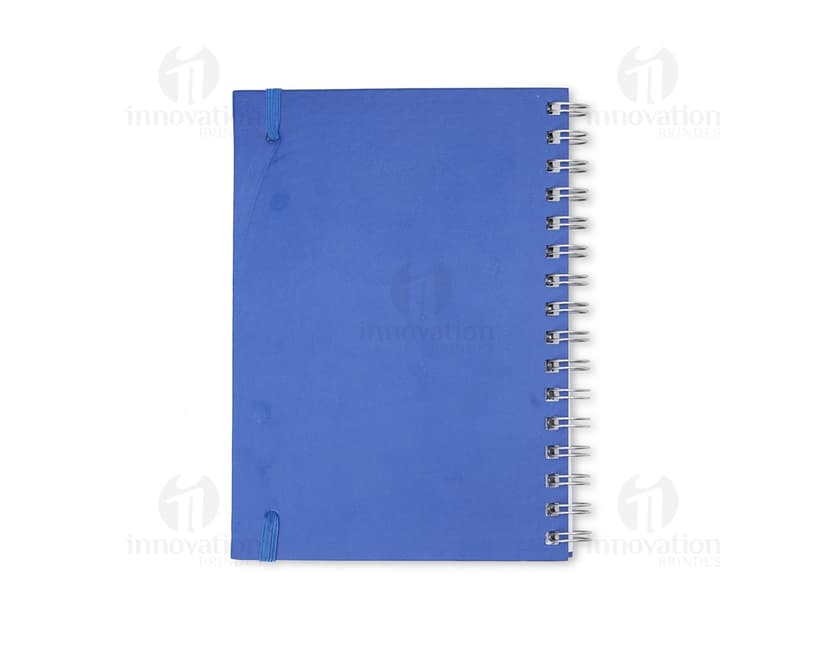 Caderno Planner preto com páginas em branco e marcador de páginas colorido.