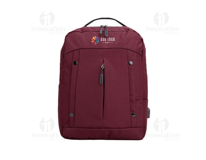 Mochila de nylon de 21 litros em marrom e preto, com alça de couro, zíperes, bolsos e tecido resistente. Ideal para viagens, uso casual e estilo moderno.