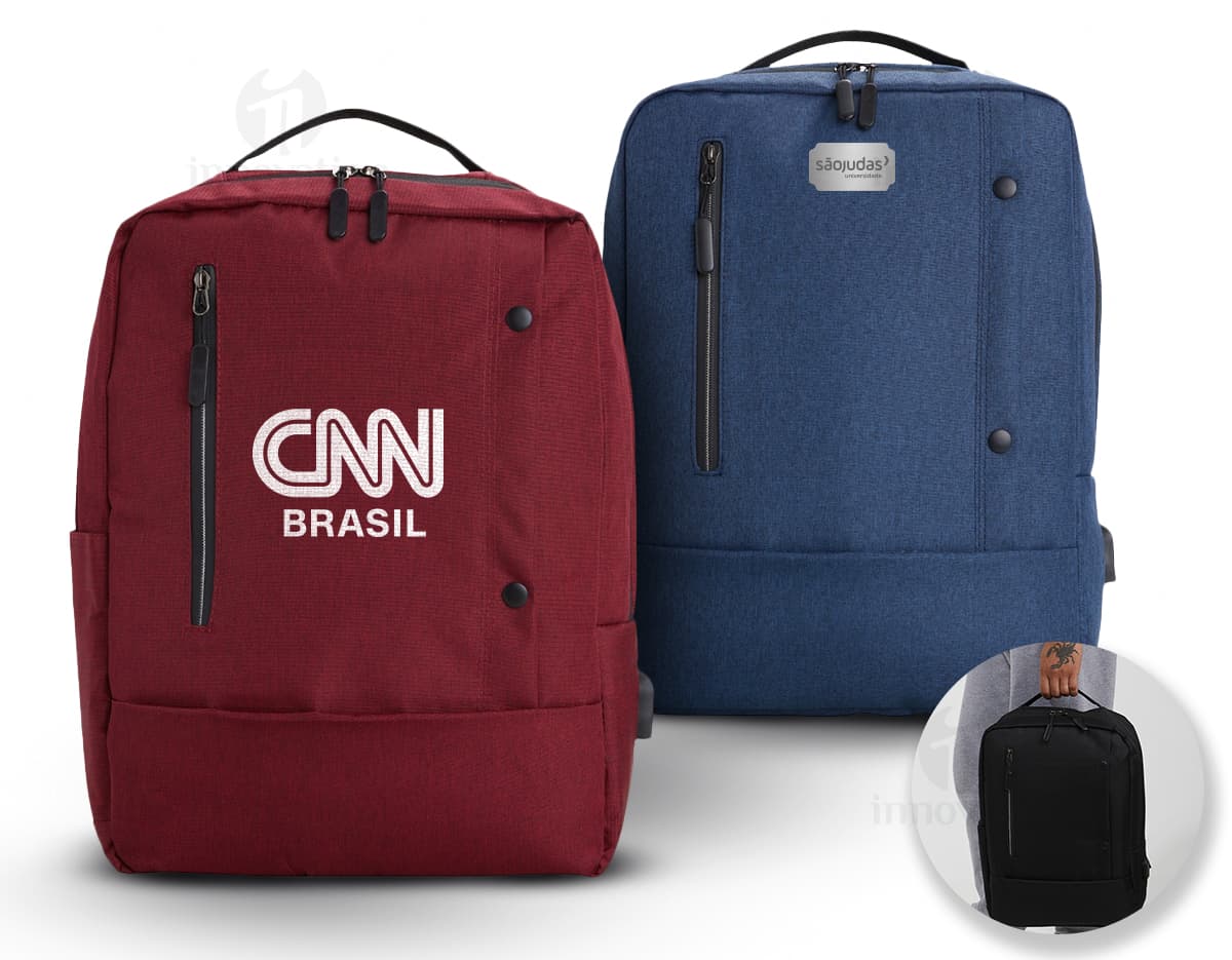 Mochila preta de nylon com 22 litros de capacidade, possui entrada USB e 4 compartimentos. Ideal para uso em viagens de negócios ou no dia a dia para transportar objetos e equipamentos de forma organizada.