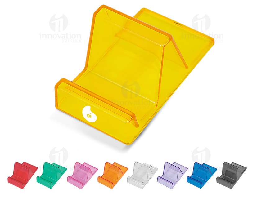 Suporte acrílico para celular em um escritório com computador, notebook, lápis, tela digital e outros equipamentos de escritório.