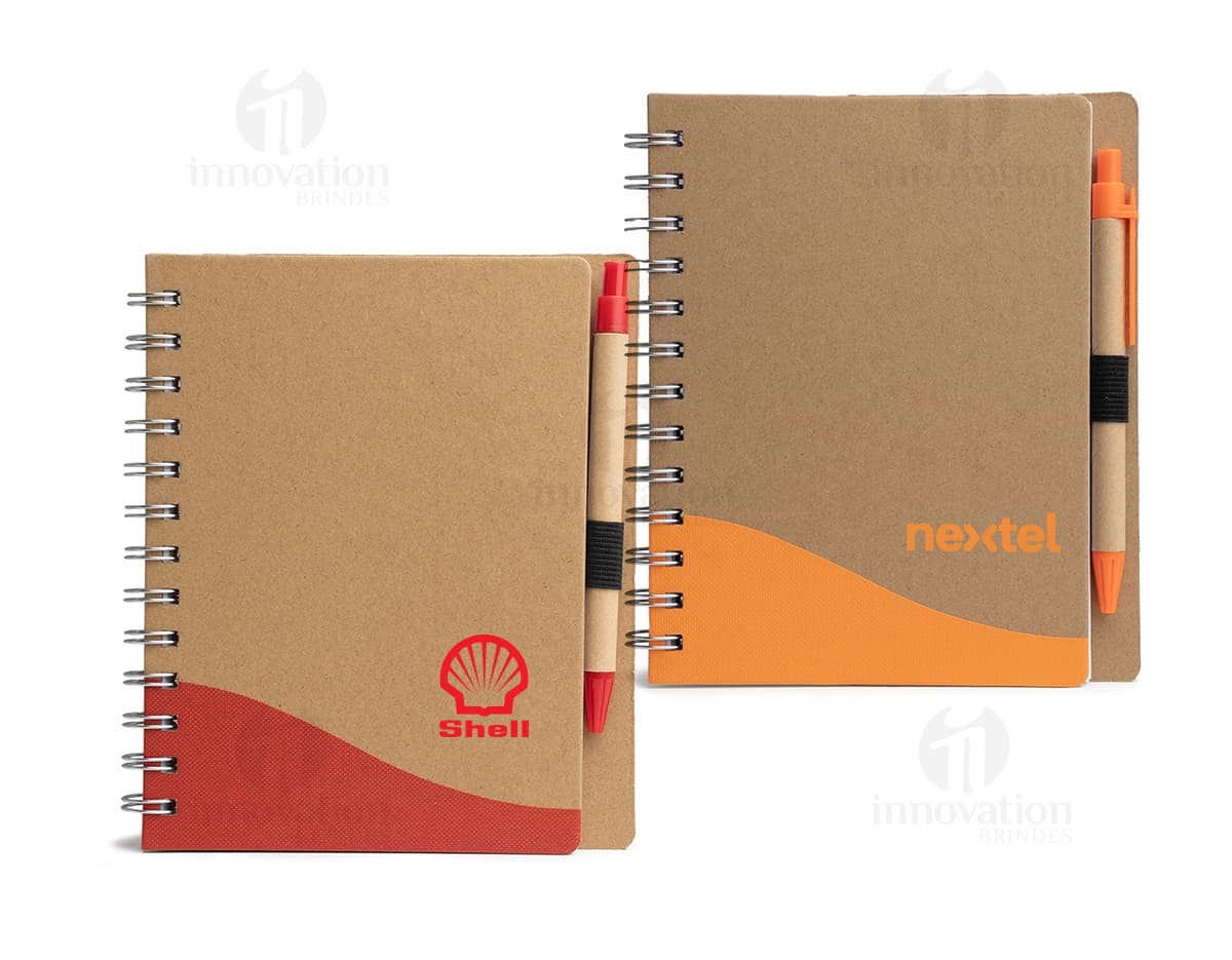 Bloco de anotações com caneta: o companheiro perfeito para os seus estudos e reuniões. Organize suas ideias e anotações de forma prática e eficiente. Ideal para quem busca otimizar o tempo e a produtividade. Adquira já o seu!