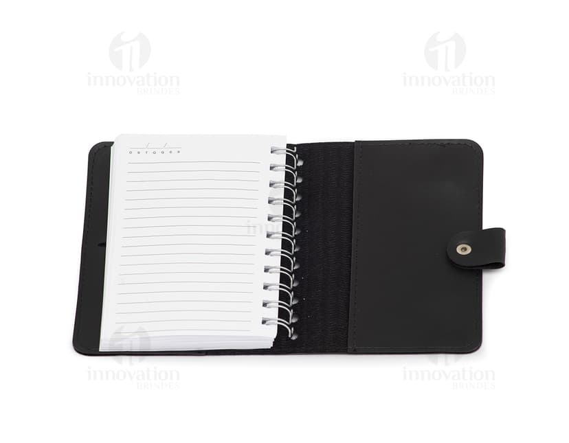Caderneta de couro sintético com papel em branco, anel em espiral, design limpo e elegante. Perfeito para reuniões de negócios, anotações e estudos.