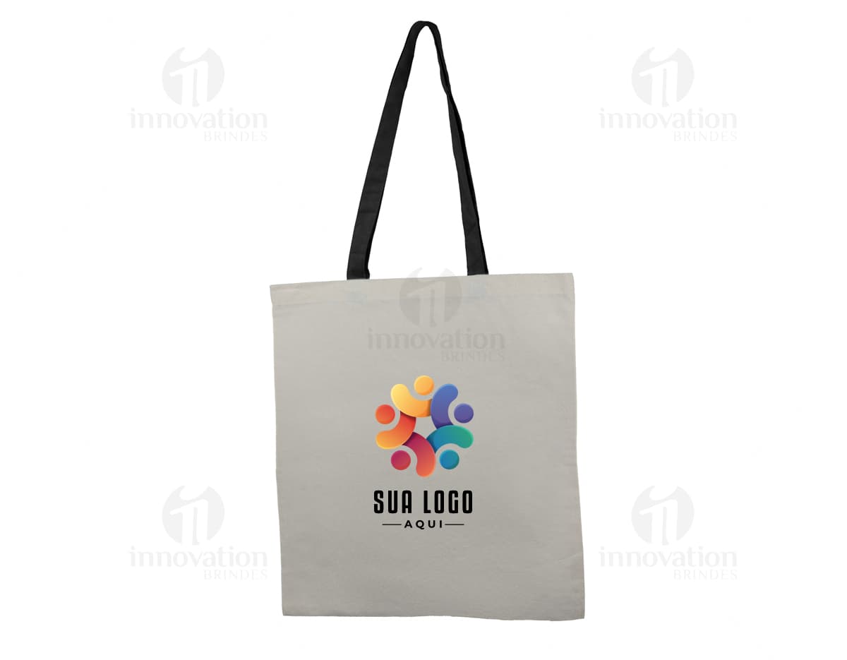 Bolsa de algodão na cor azul com alças curtas e detalhes em costura branca.