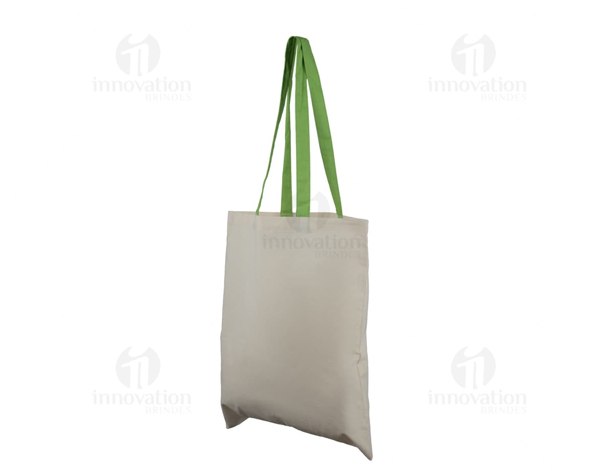 Bolsa de algodão na cor azul com alças curtas e detalhes em costura branca.