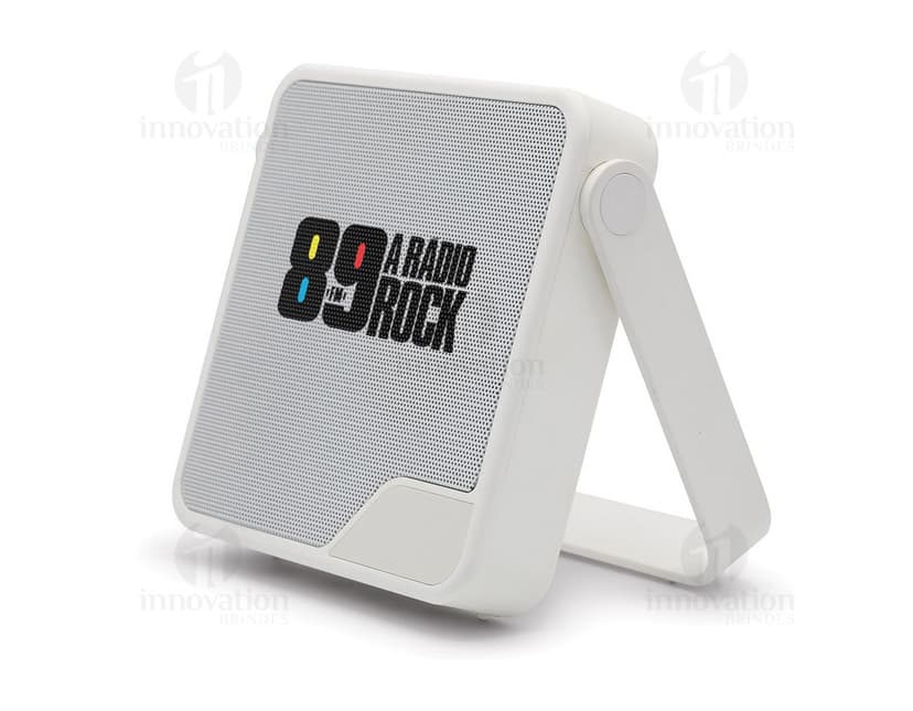 Caixa de som preta com botões de controle de volume e conexão Bluetooth no lado direito e textura de tecido na parte frontal.