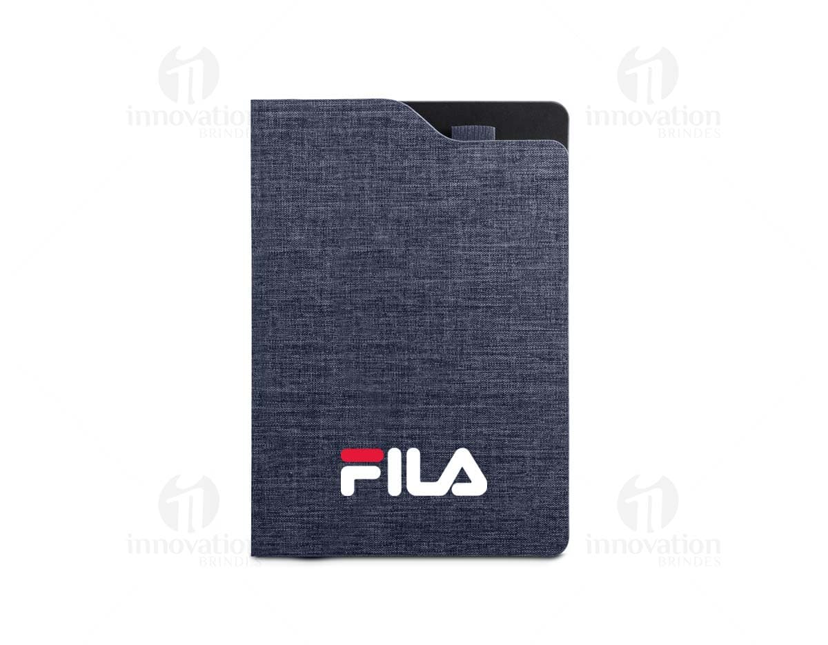 Caderno A5 - LOBATO, capa dura, cor azul com estampa de personagens infantis. Páginas pautadas e marcador de páginas.