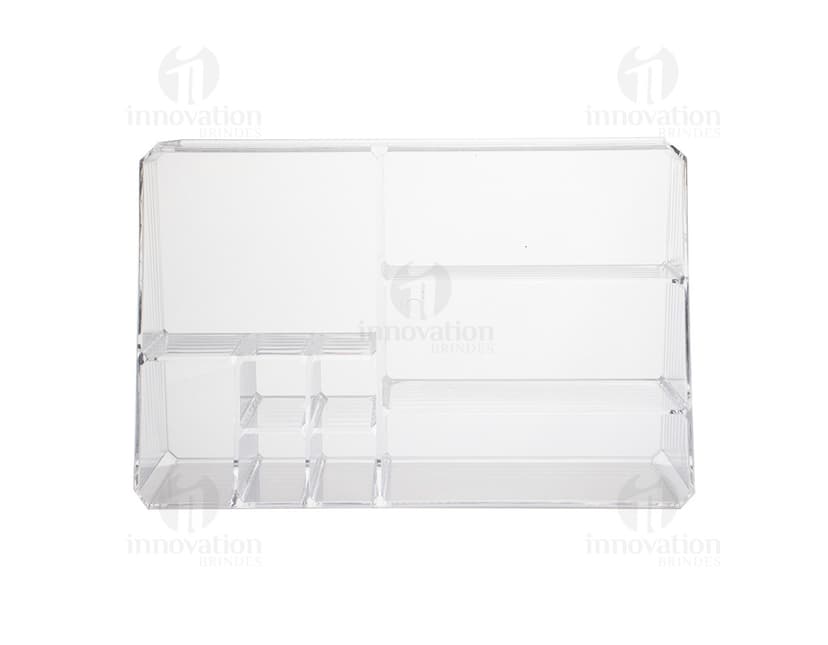 Organizador Acrílico transparente com cinco divisórias para armazenamento de objetos.