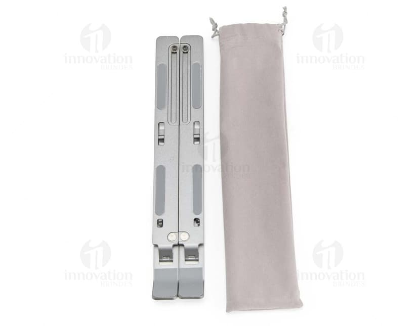Suporte retrátil para notebook feito de metal e aço, sendo uma ferramenta tecnológica e moderna para facilitar o uso do dispositivo.